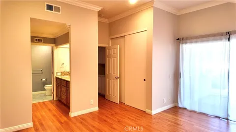 a view of a bathroom with a glass shower door