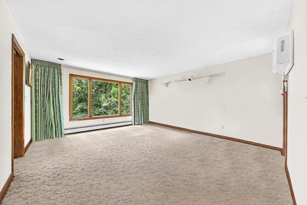 57 South Street Natick, MA 01760 - Photo 11 of 36 an empty room with a window