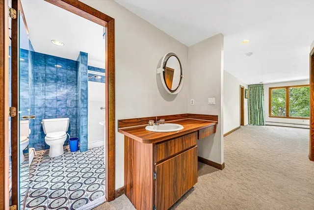 a kitchen with a stove and a cabinets