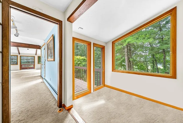 a view of a room with a large window