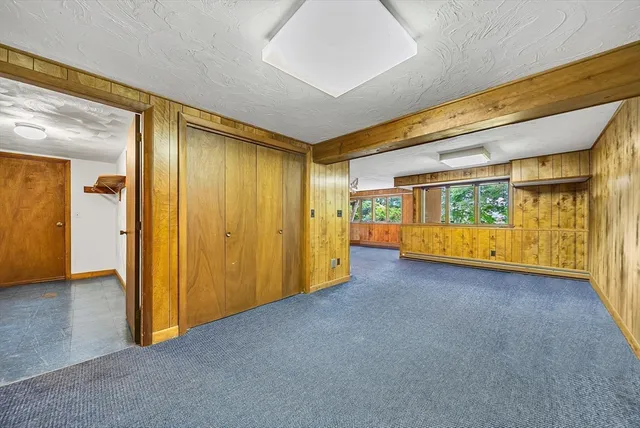 an empty room with yellow walls