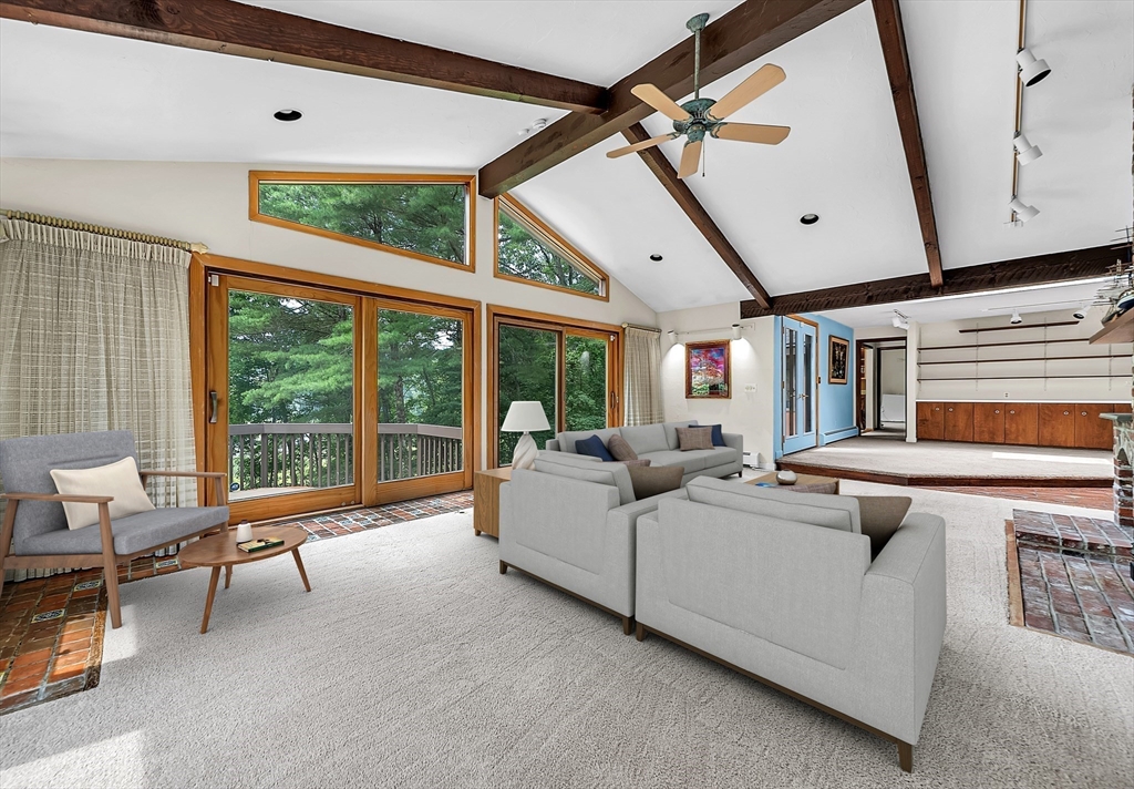 57 South Street Natick, MA 01760 - Photo 10 of 36 a living room with furniture and a floor to ceiling window