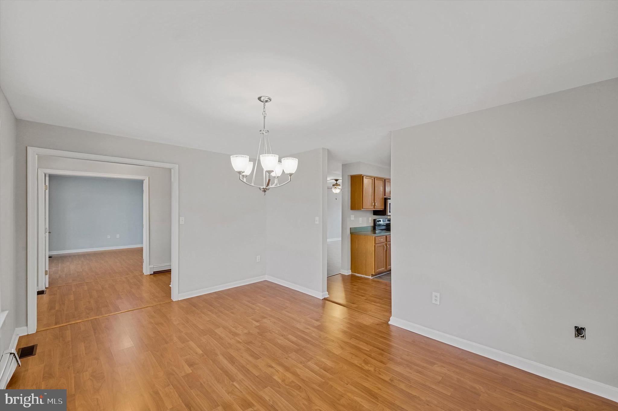 7510 Old Receiver Road Frederick, MD 21702 - Photo 11 of 57 wooden floor in an empty room with a window