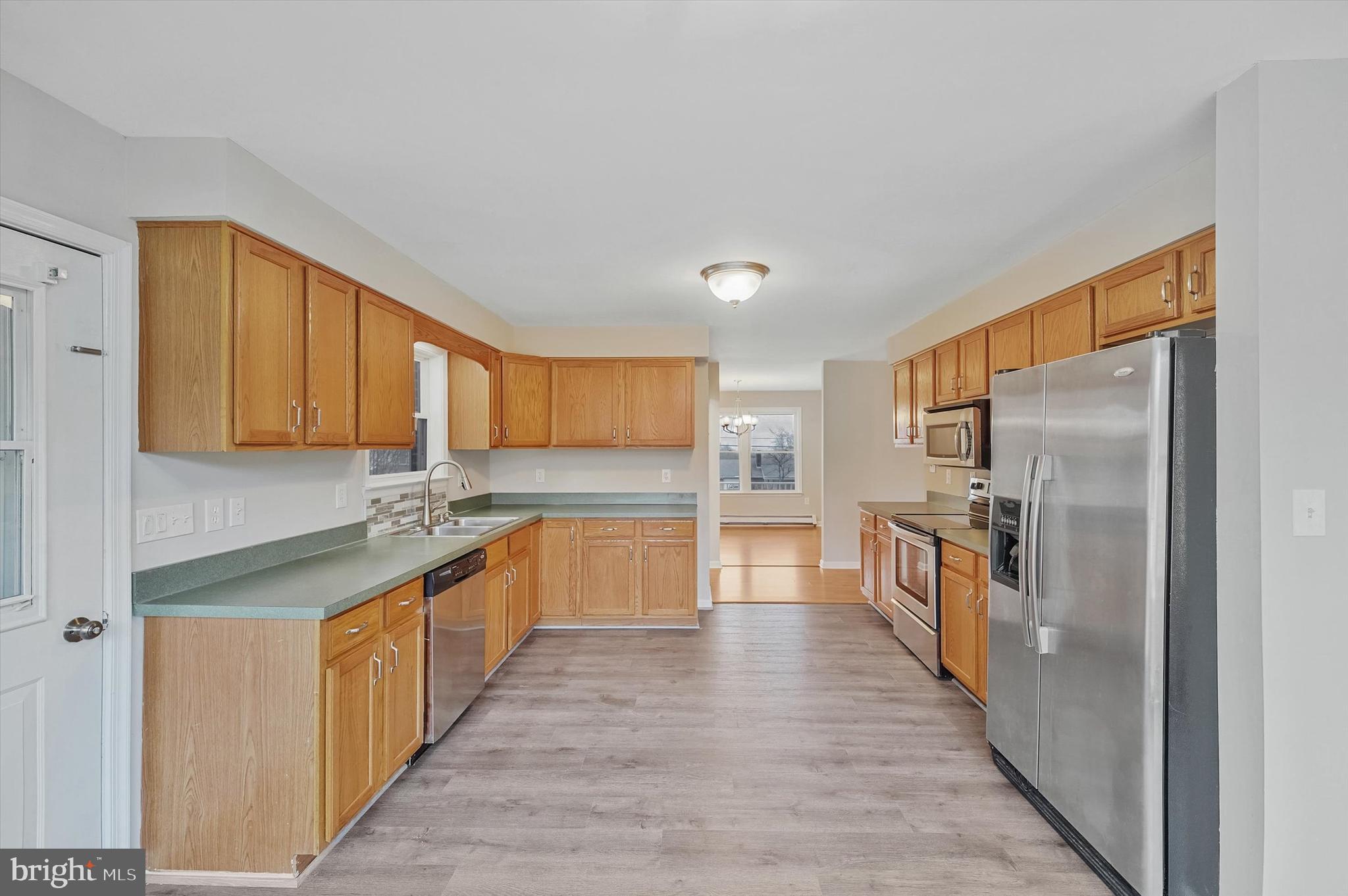 7510 Old Receiver Road Frederick, MD 21702 - Photo 18 of 57 a kitchen with stainless steel appliances granite countertop a refrigerator and a sink
