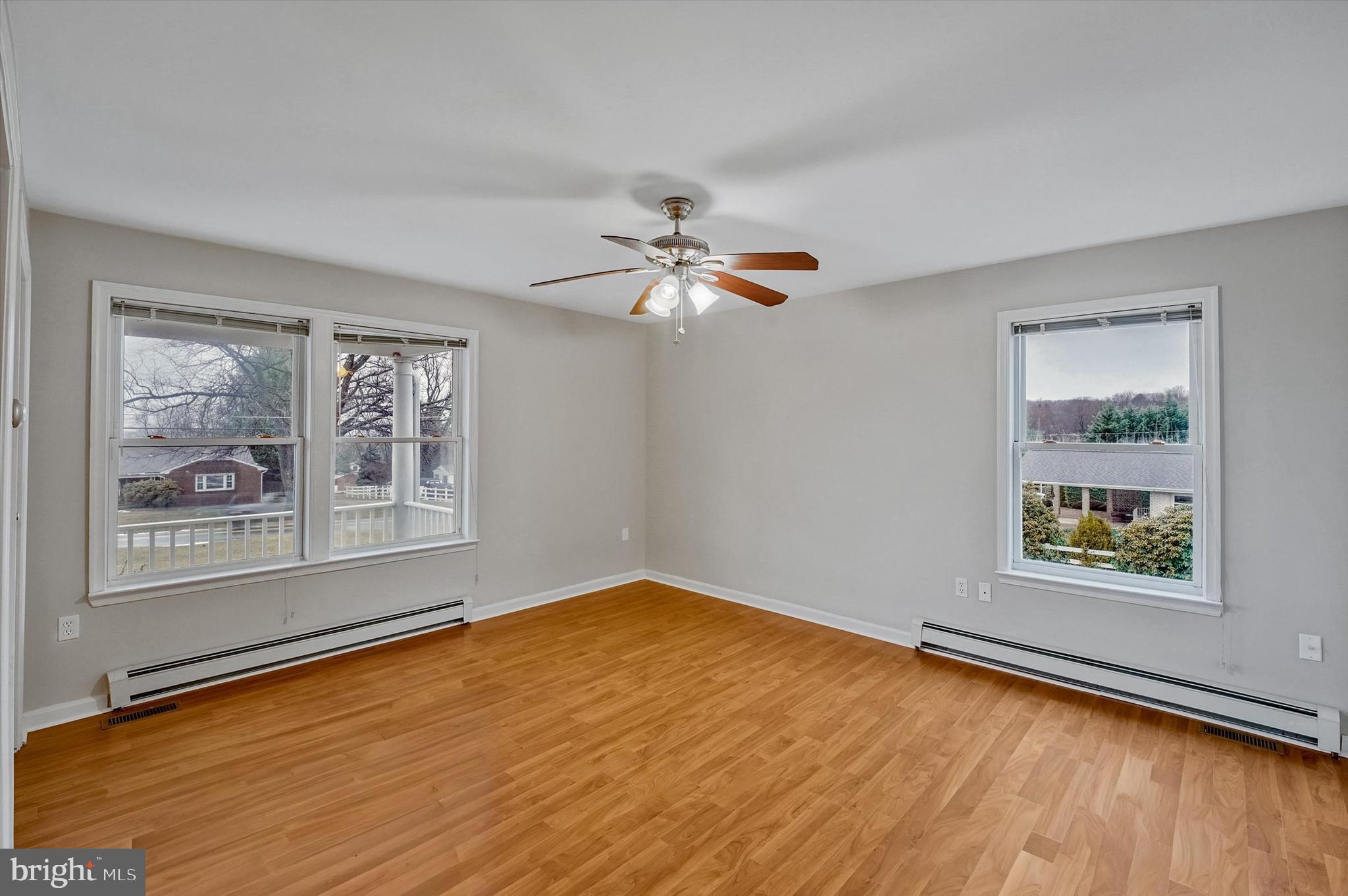 7510 Old Receiver Road Frederick, MD 21702 - Photo 25 of 57 a view of an empty room with a window and wooden floor