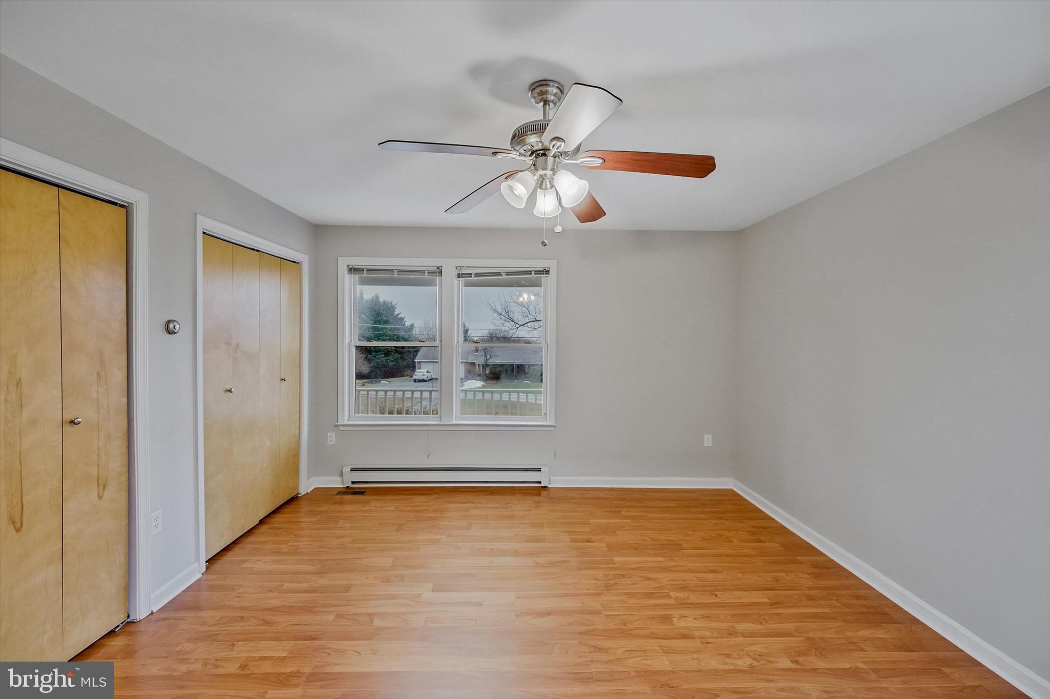 7510 Old Receiver Road Frederick, MD 21702 - Photo 26 of 57 a view of an empty room with window and chandelier fan