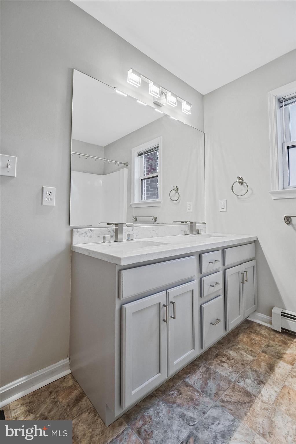 7510 Old Receiver Road Frederick, MD 21702 - Photo 29 of 57 a bathroom with a sink and a mirror