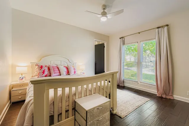 a view of a hallway with a bedroom