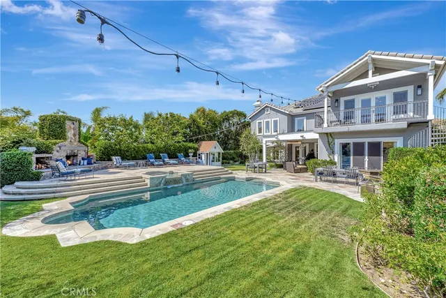 a kitchen with sink refrigerator and cabinets