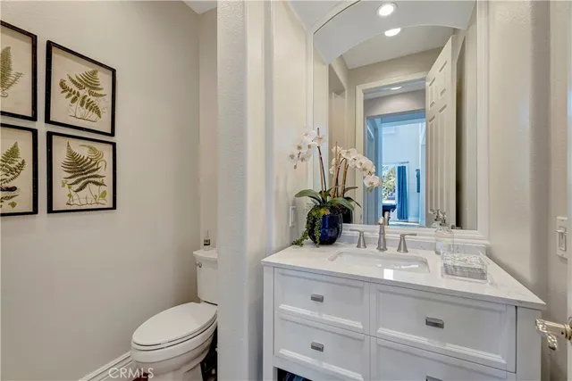 a bed room with a bed and a television