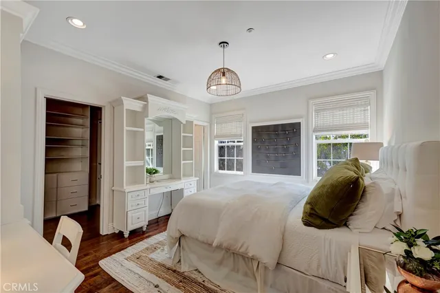 a bathroom with a double vanity sink mirror and shower