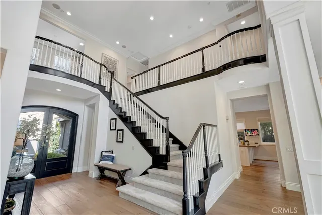 a kitchen with a sink stainless steel appliances and cabinets