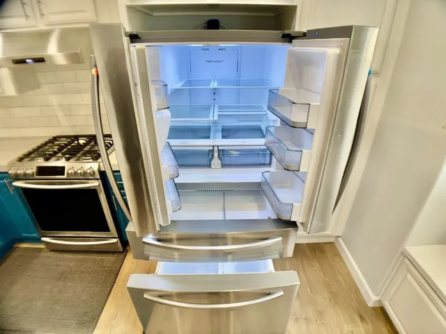 a view of a bathroom from a hallway