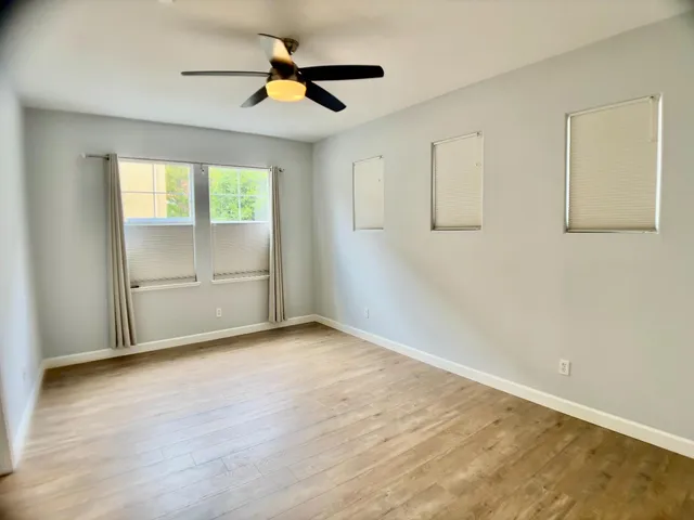 a bathroom with a shower and a shower head
