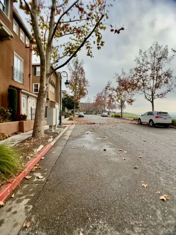 a view of a backyard with a sitting area