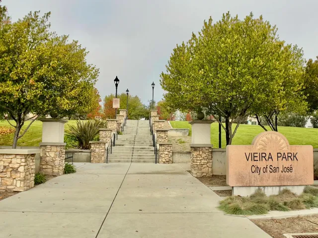 a front view of a building with garden