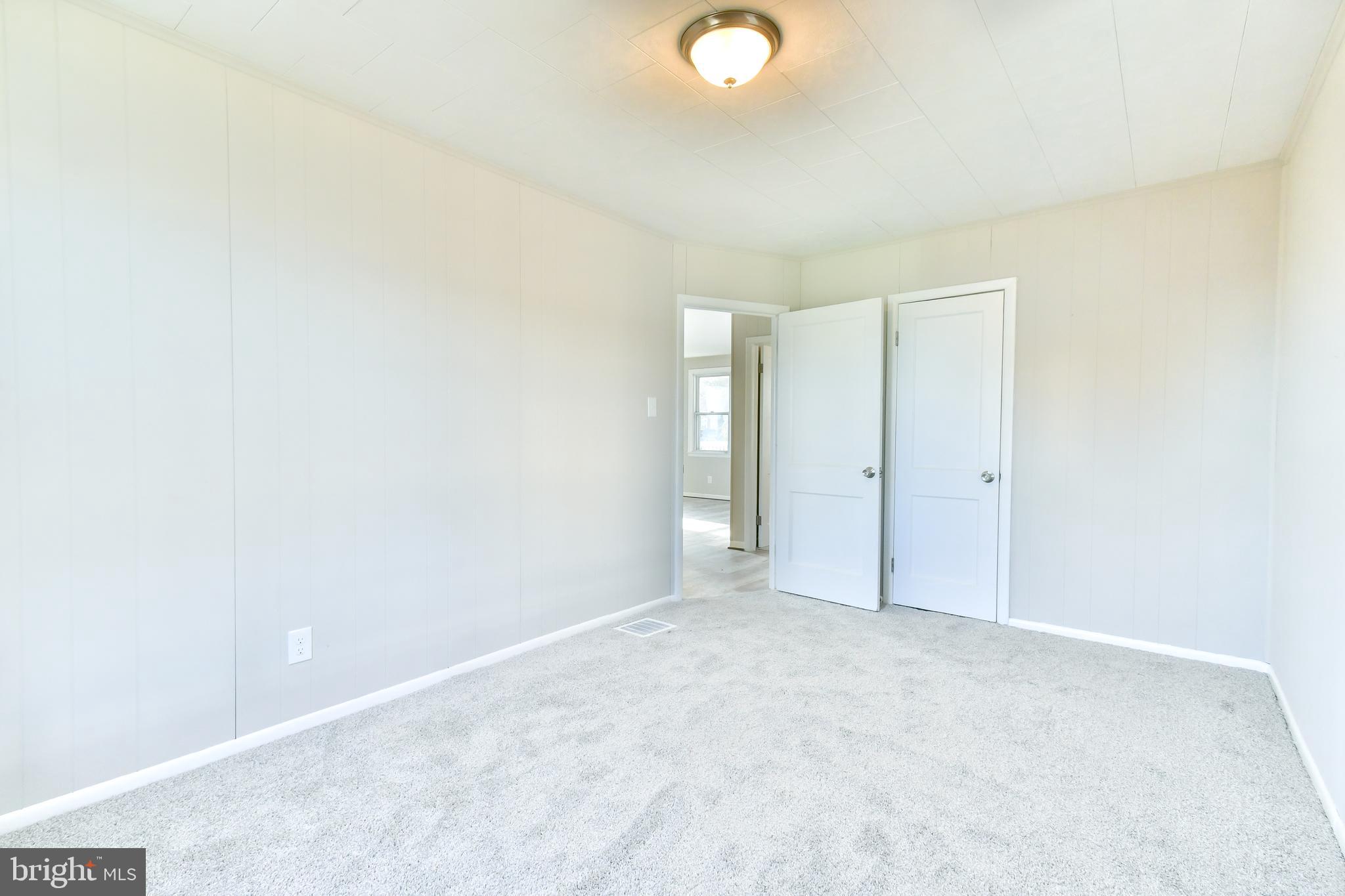 7618 Spruce Road Baltimore, MD 21222 - Photo 15 of 42 a view of an empty room