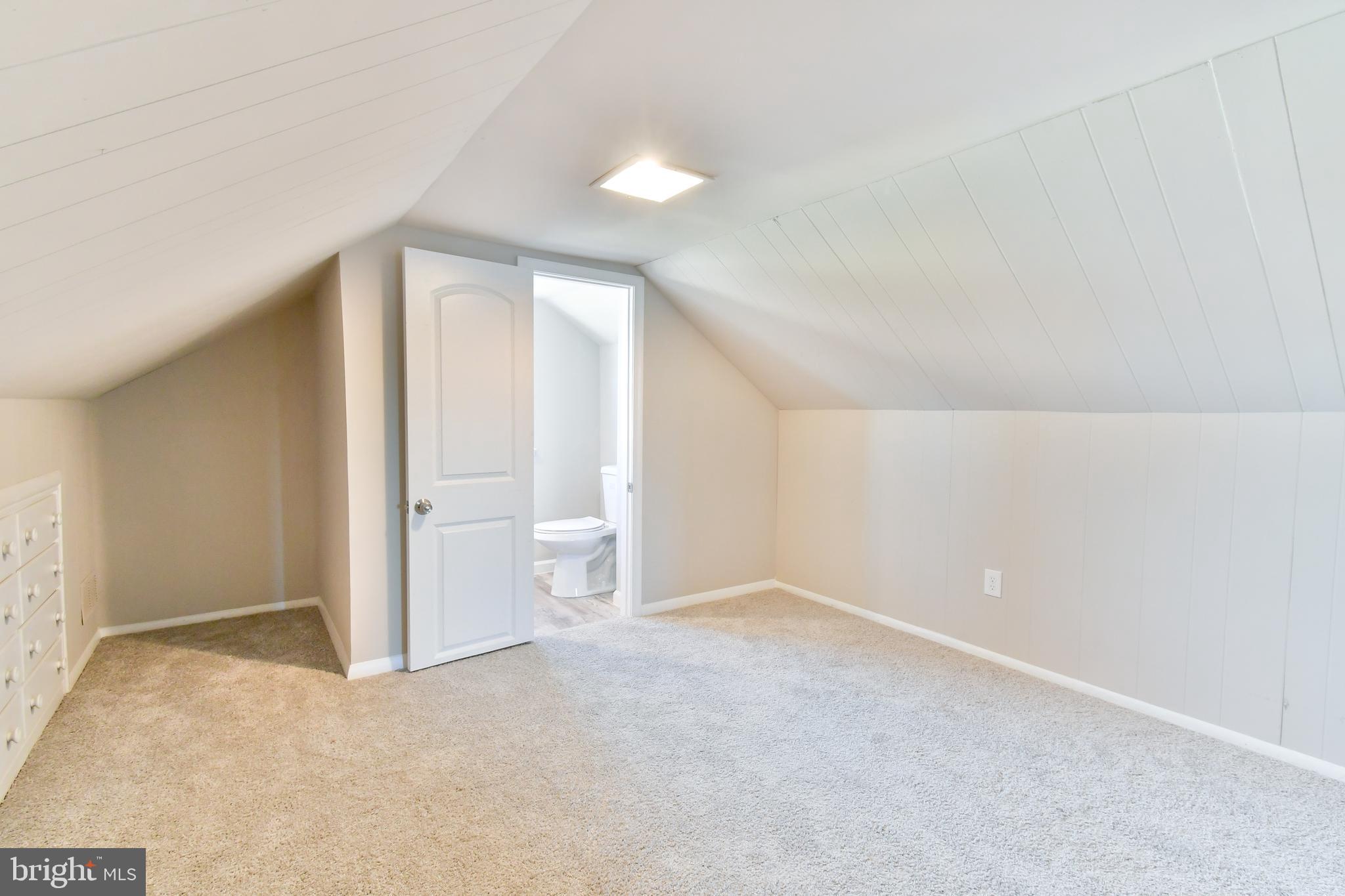 7618 Spruce Road Baltimore, MD 21222 - Photo 25 of 42 an empty room with a bathroom