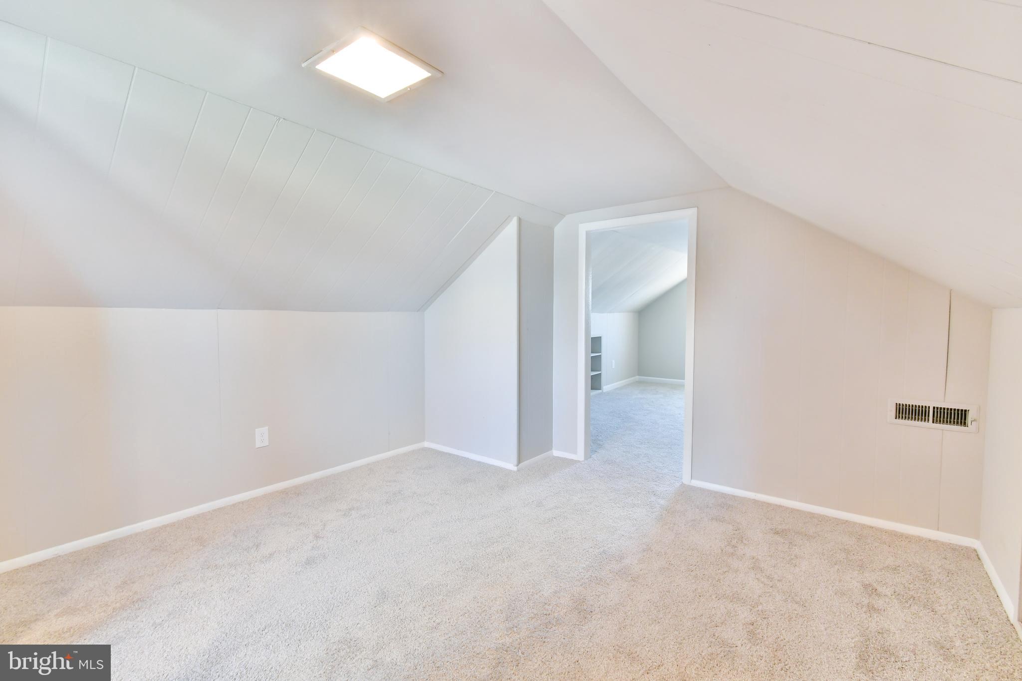 7618 Spruce Road Baltimore, MD 21222 - Photo 26 of 42 an empty room with an entryway