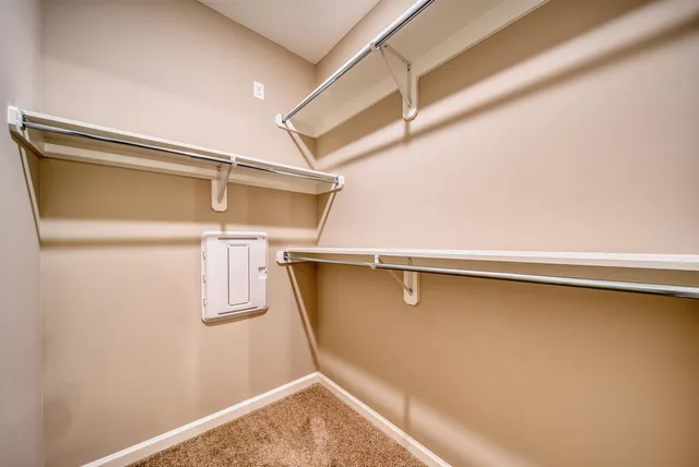 a view of a room with racks on the wall