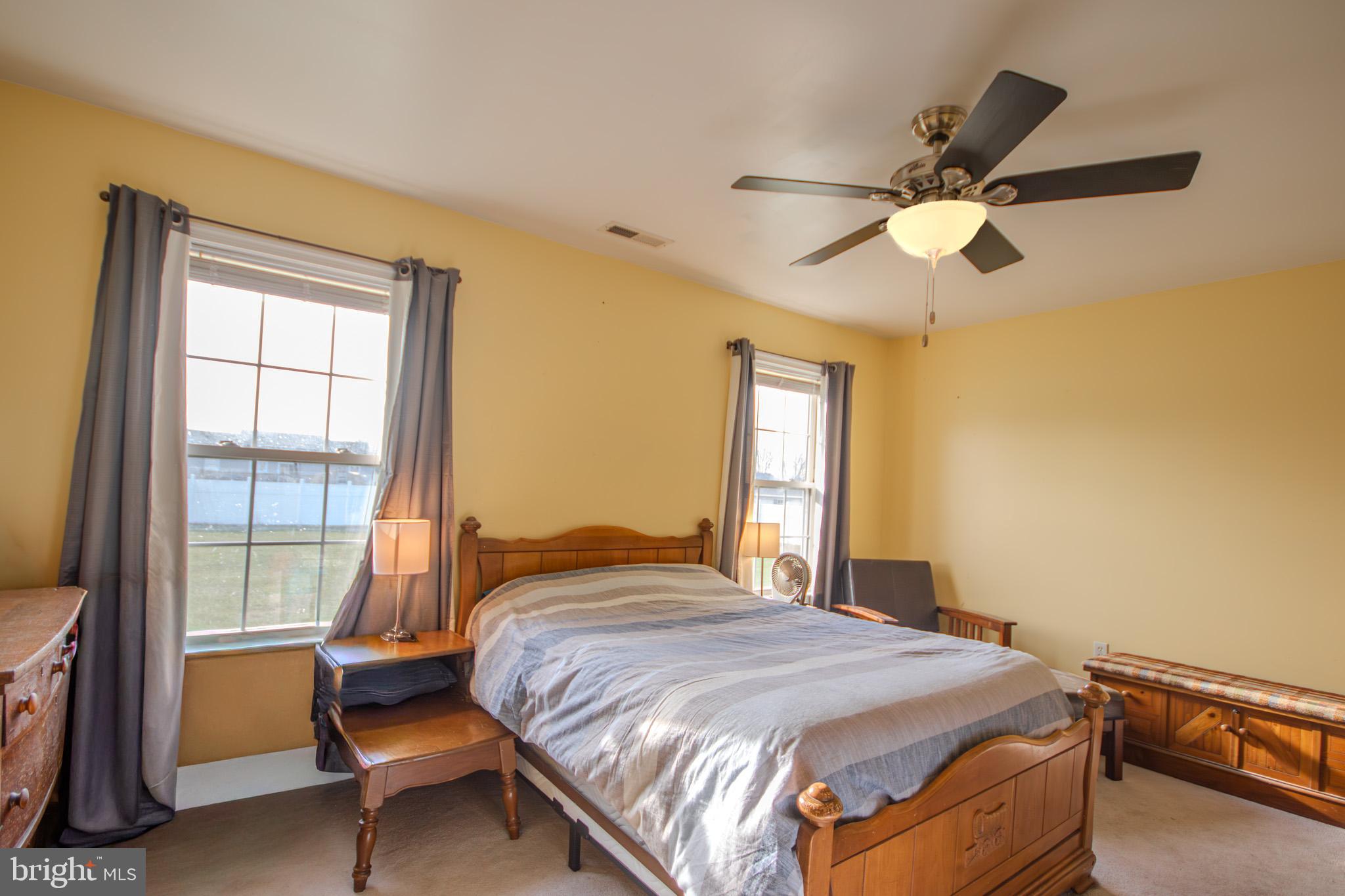 30071 Deanwood Road Princess Anne, MD 21853 - Photo 16 of 37 a bedroom with a bed and a window