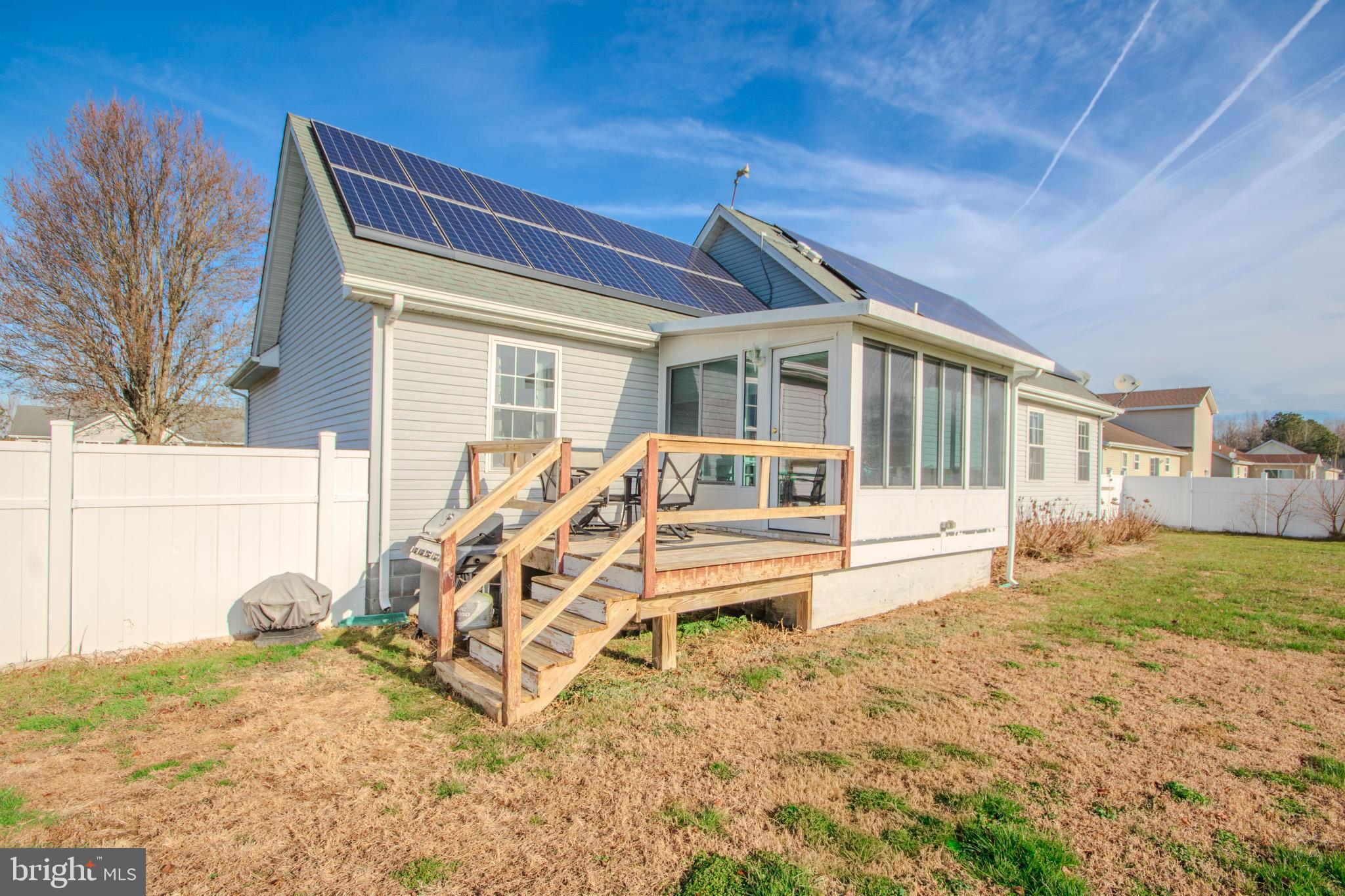 30071 Deanwood Road Princess Anne, MD 21853 - Photo 32 of 37 a view of a house with backyard and sitting area