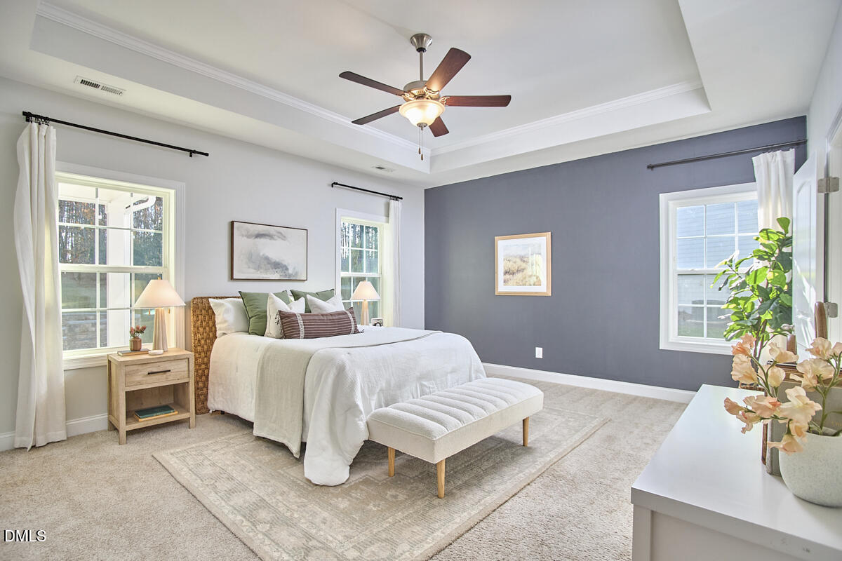 8600 Rowan Oak Court Wake Forest, NC 27587 - Photo 17 of 42 a living room with furniture and a large window