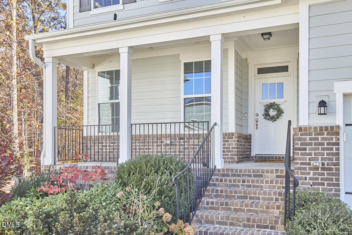 8600 Rowan Oak Court Wake Forest, NC 27587 - Photo 2 of 42 front view of a house