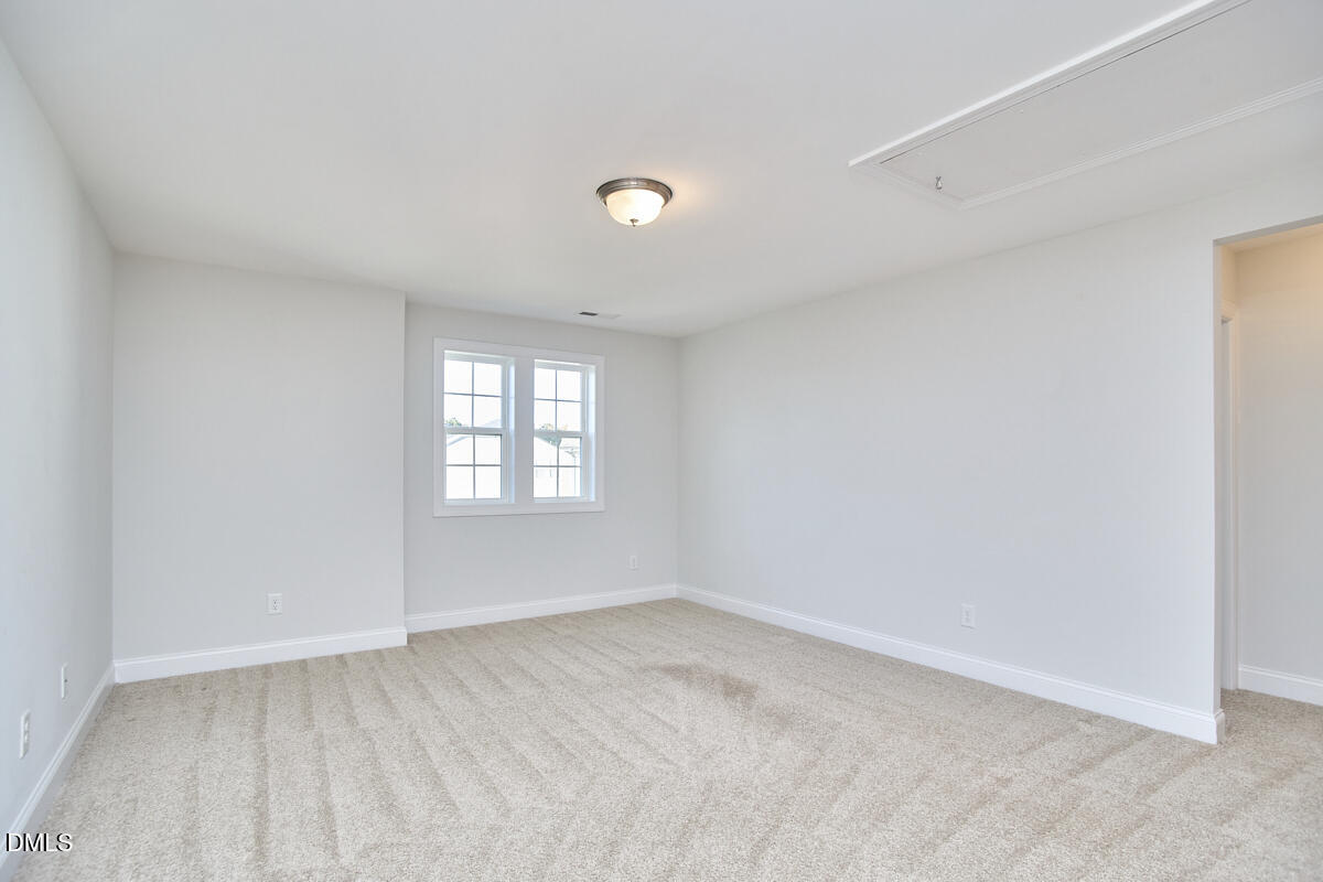 8600 Rowan Oak Court Wake Forest, NC 27587 - Photo 28 of 42 an empty room with a window