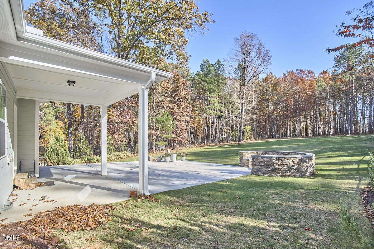 8600 Rowan Oak Court Wake Forest, NC 27587 - Photo 35 of 42 a view of a house with a yard