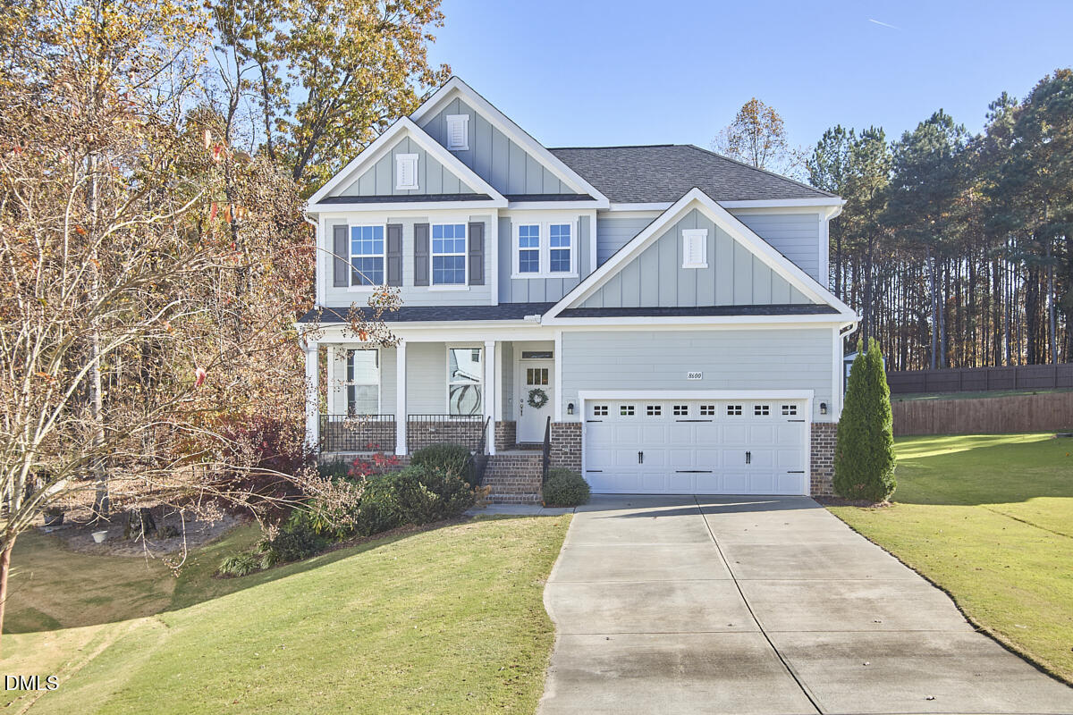 8600 Rowan Oak Court Wake Forest, NC 27587 - Photo 40 of 42 front view of a house with a yard