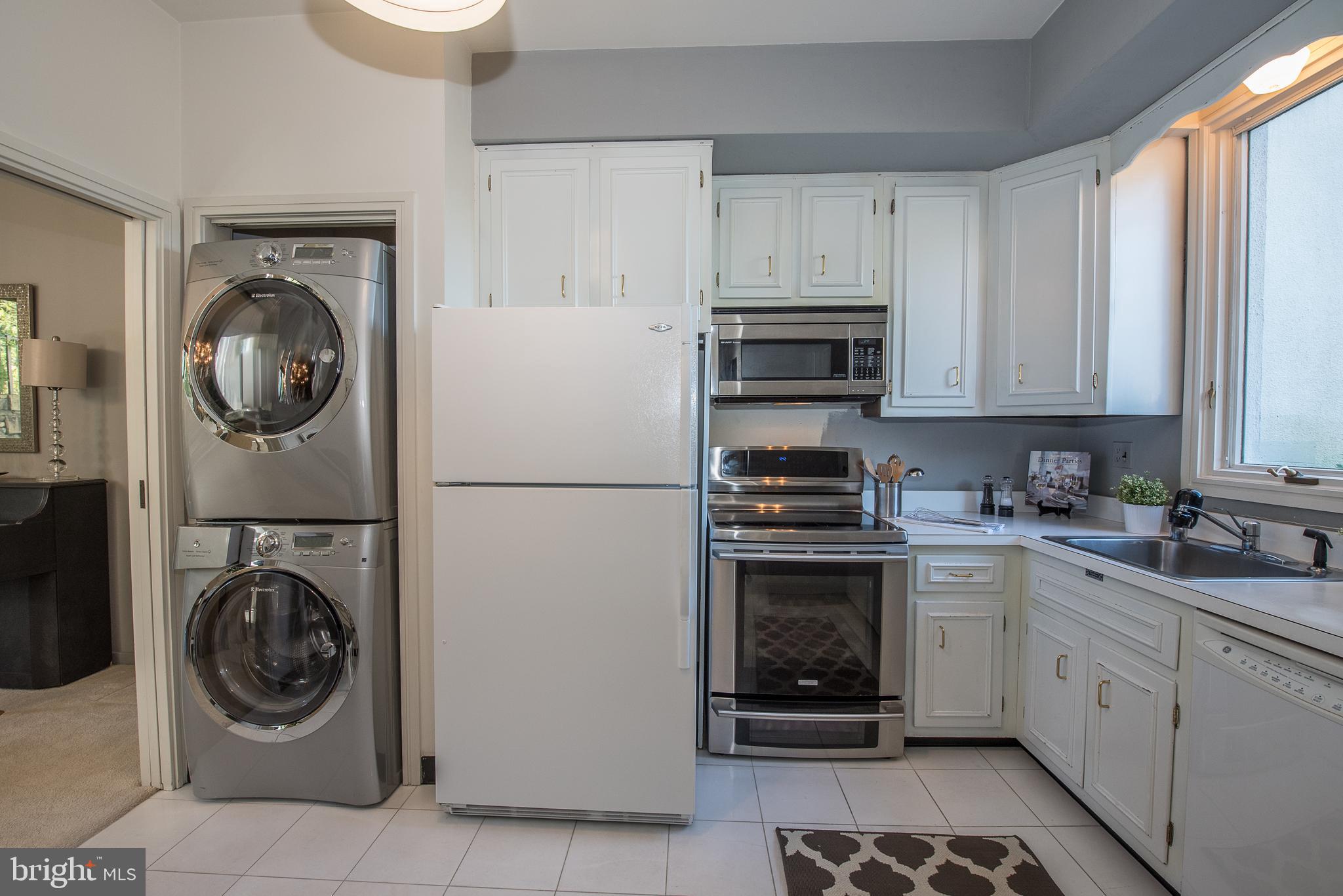 5 Avignon Devon, PA 19333 - Photo 18 of 32 Kitchen with laundry.