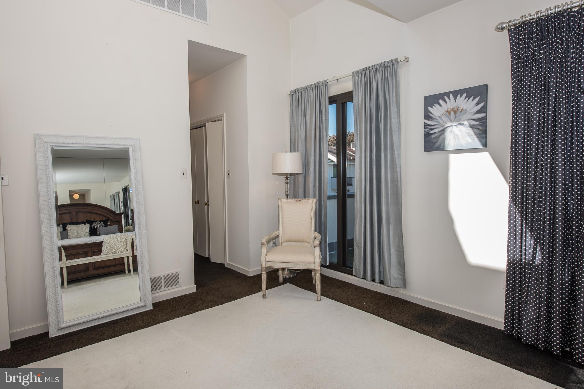 5 Avignon Devon, PA 19333 - Photo 22 of 32 Master bedroom with hall to closets & Bath.
