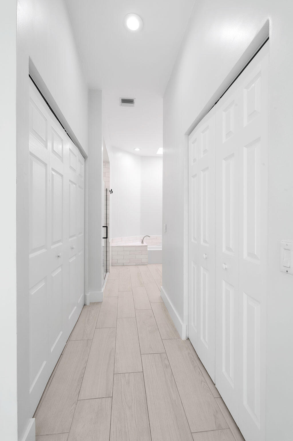 168 South Hampton Drive Jupiter, FL 33458 - Photo 15 of 33 a view of a hallway with white walls
