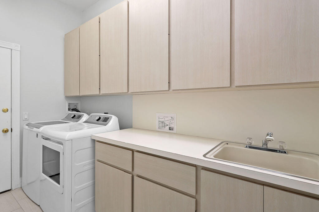 168 South Hampton Drive Jupiter, FL 33458 - Photo 26 of 33 a view of a storage and utility room with a sink