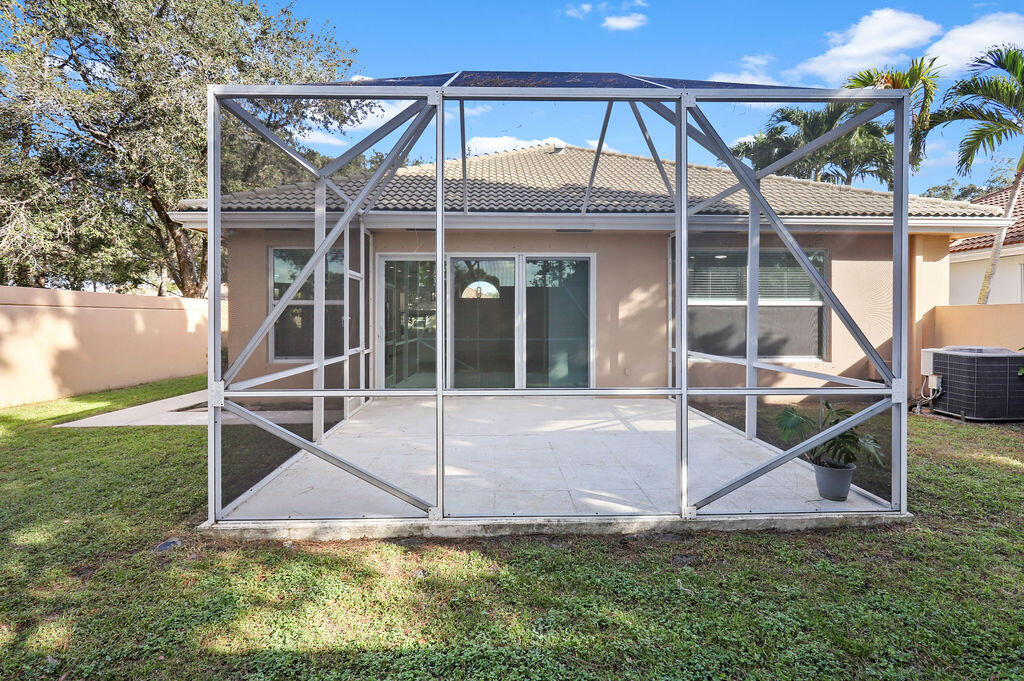168 South Hampton Drive Jupiter, FL 33458 - Photo 30 of 33 a view of a house with backyard