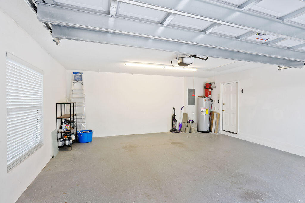 168 South Hampton Drive Jupiter, FL 33458 - Photo 32 of 33 a view of room with air conditioner duct and materials on floor