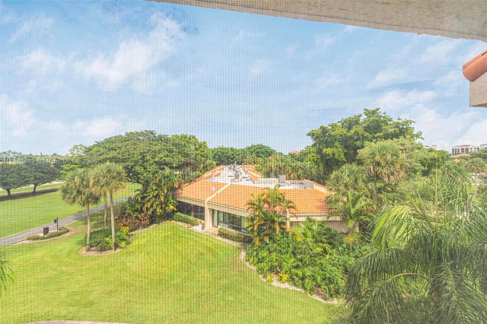 7507 La Paz Boulevard, Unit 407 Boca Raton, FL 33433 - Photo 15 of 34 a view of a swimming pool with a yard