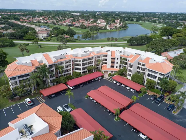 an aerial view of city and lake