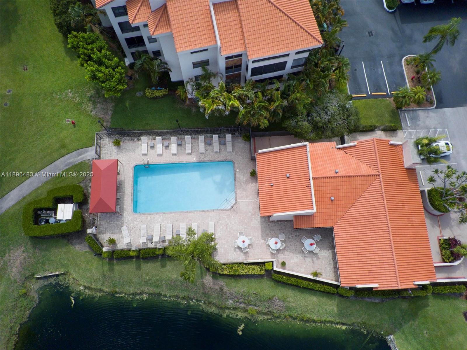 7507 La Paz Boulevard, Unit 407 Boca Raton, FL 33433 - Photo 33 of 34 an aerial view of a house