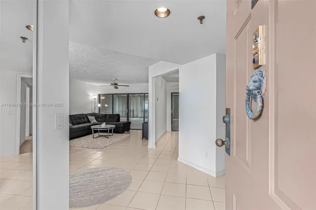 a view of living room with furniture and window