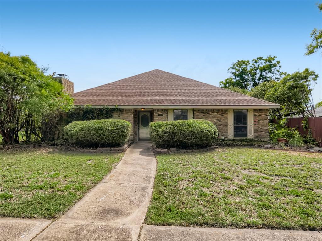 a house view with a garden space