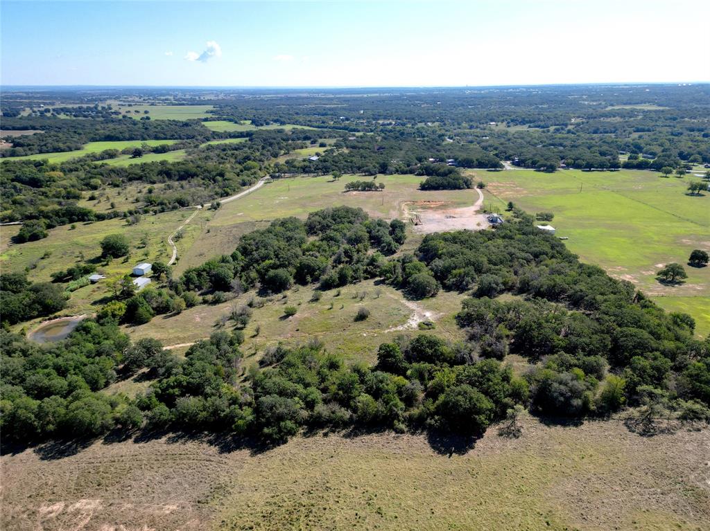 0 County Road 3672 Springtown, TX 76082 - Photo 10 of 24 an aerial view of residential houses with outdoor space and trees