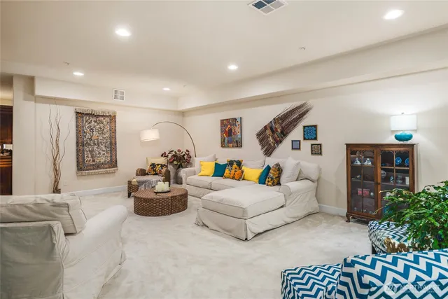a living room with furniture and a couch