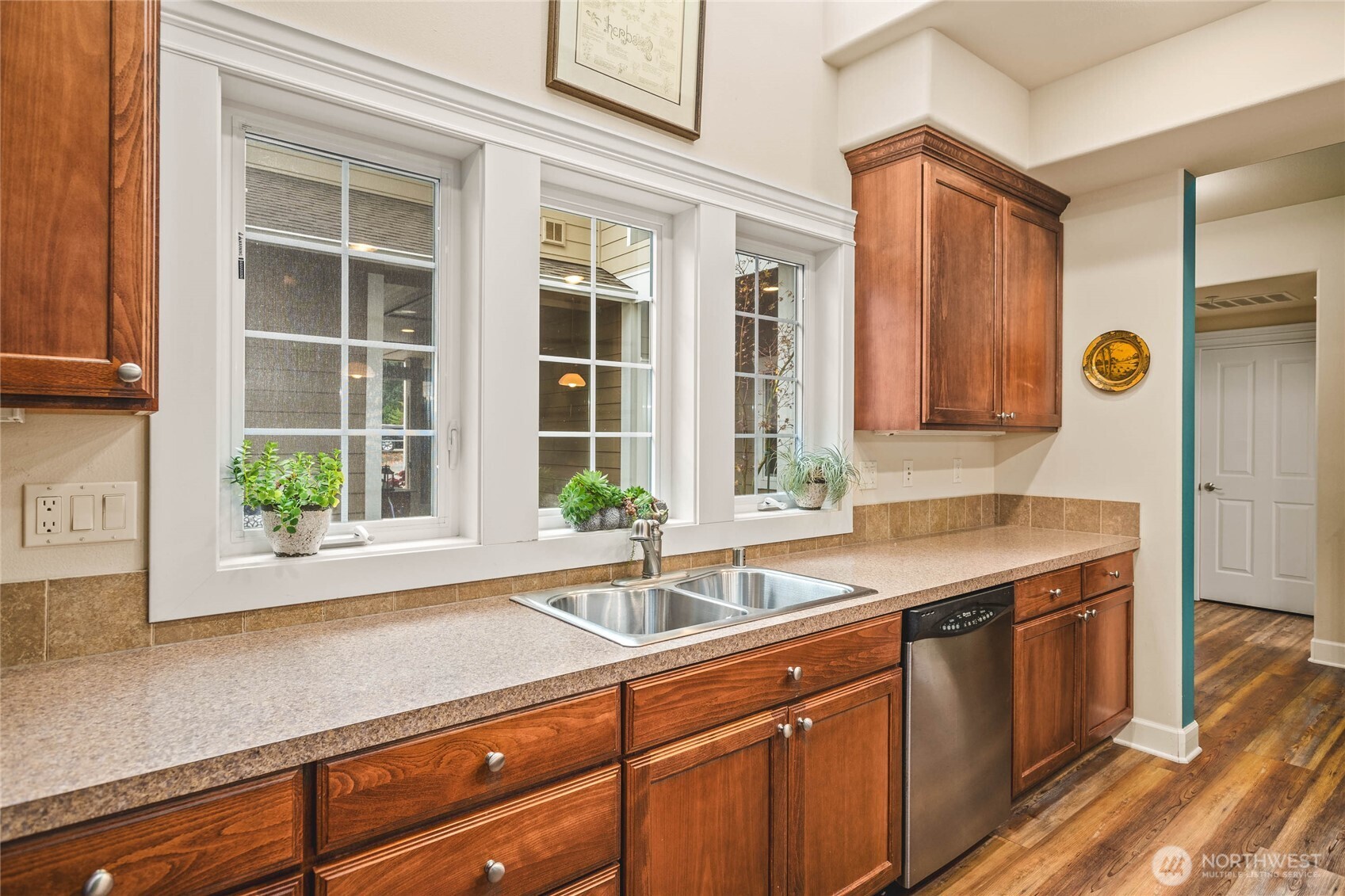 2301 Sundown Court Anacortes, WA 98221 - Photo 10 of 37 a kitchen with a sink and a window
