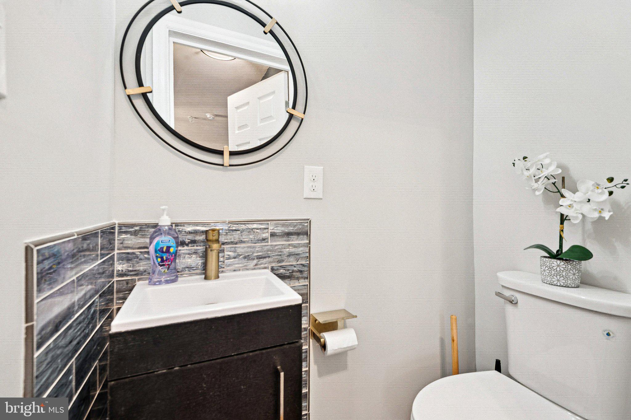805 Spa Road Annapolis, MD 21401 - Photo 21 of 48 Sleek modern bathroom with elegant touches.