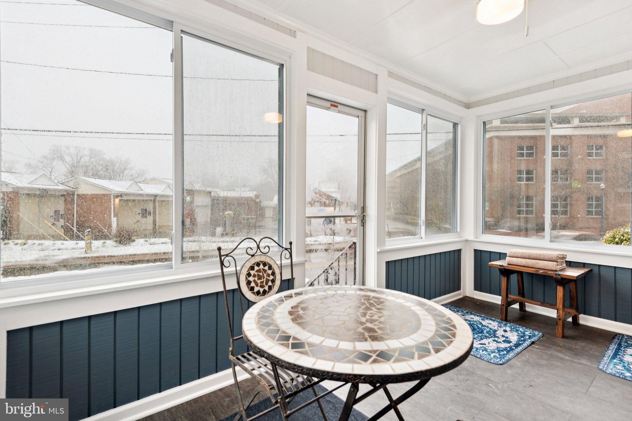805 Spa Road Annapolis, MD 21401 - Photo 9 of 48 Cozy sunroom with winter views.