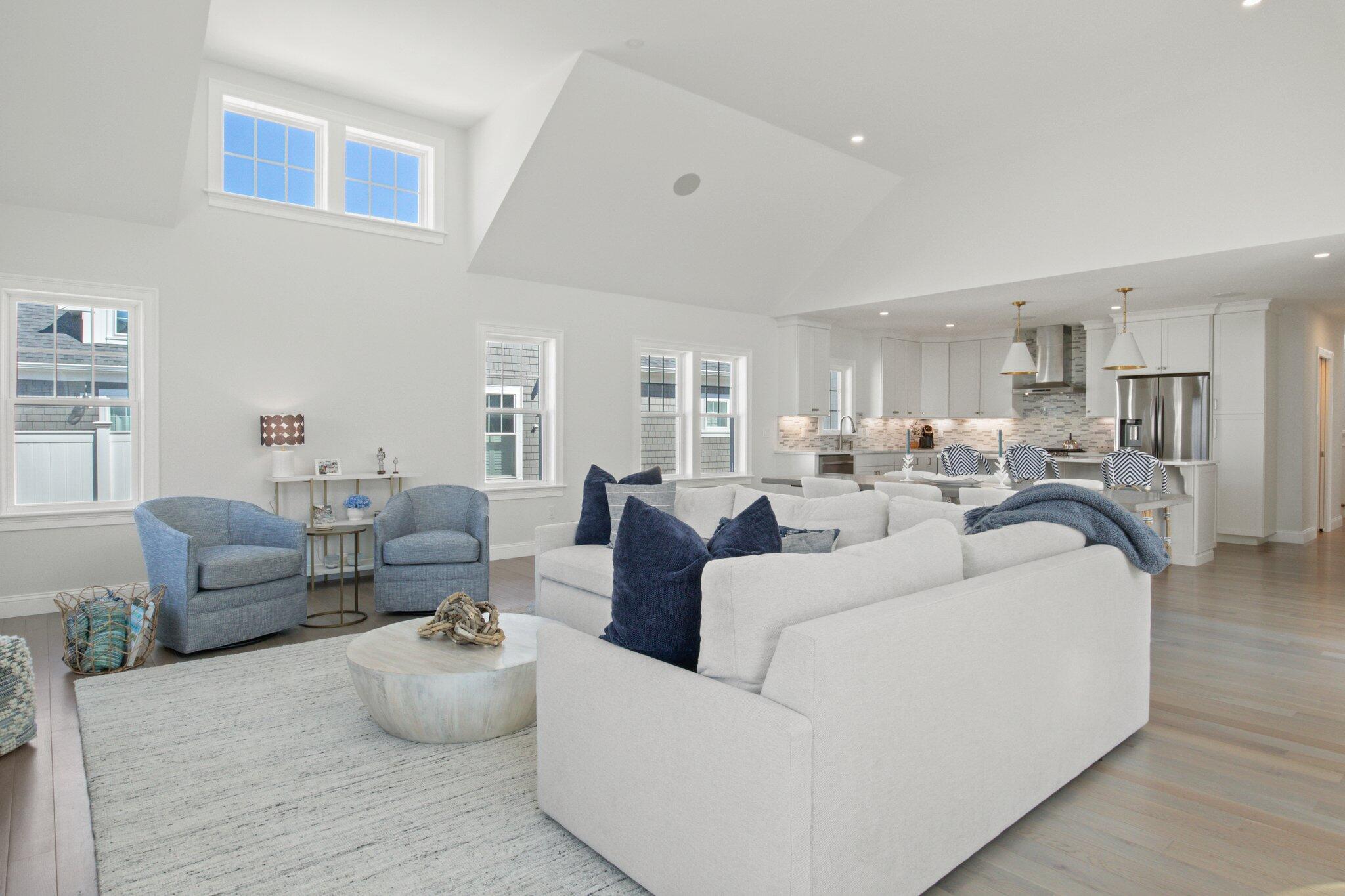 85 Cobblestone Circle Mashpee, MA 02649 - Photo 11 of 42 a living room with furniture and a view of kitchen