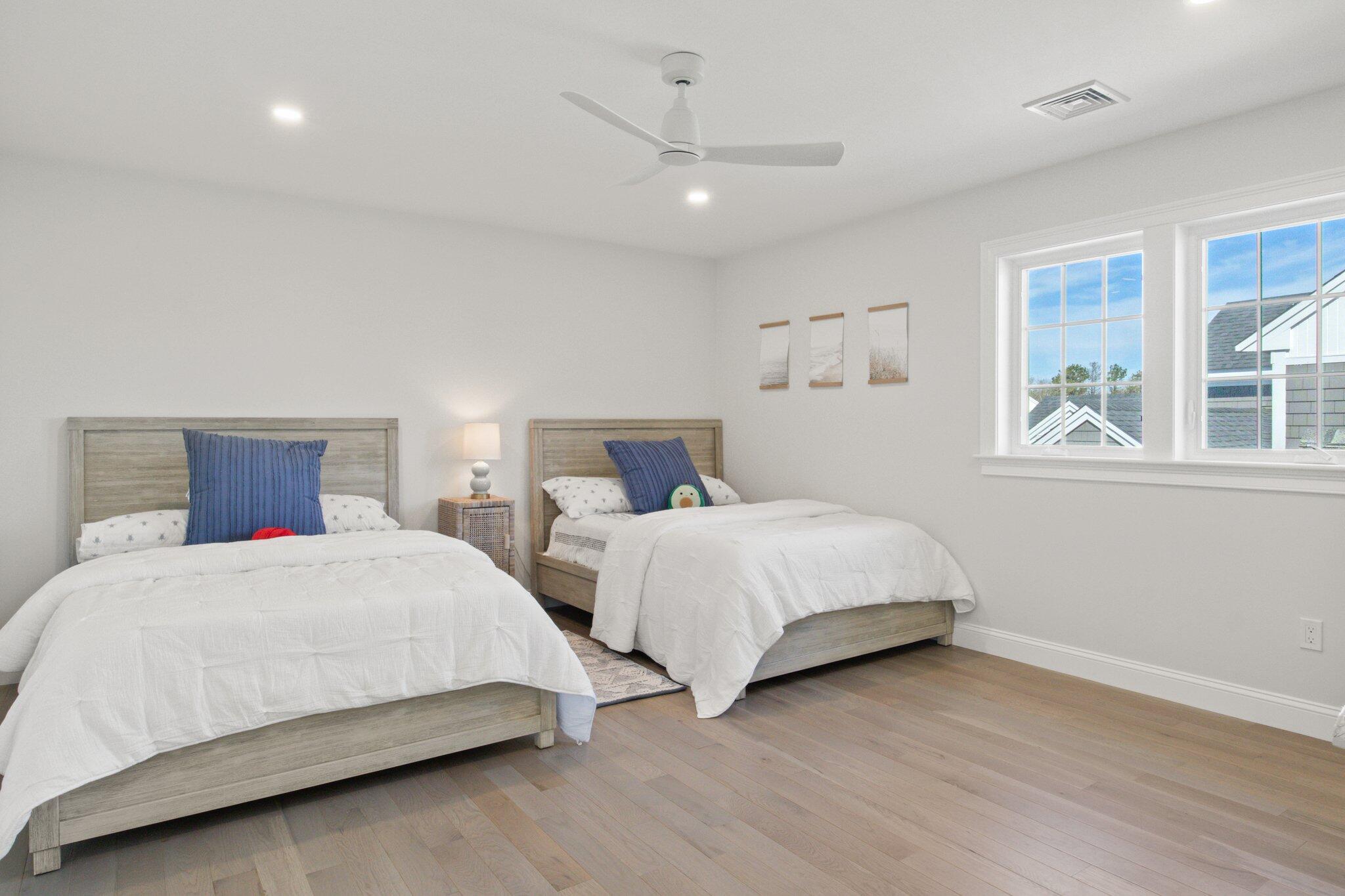 85 Cobblestone Circle Mashpee, MA 02649 - Photo 25 of 42 a bedroom with two beds and a window