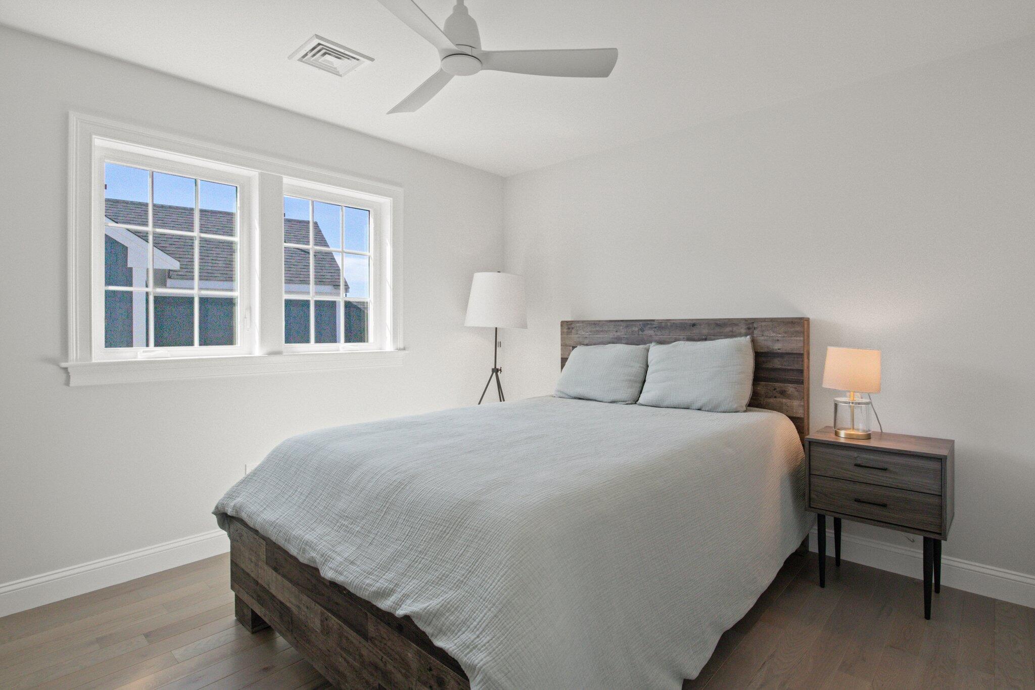 85 Cobblestone Circle Mashpee, MA 02649 - Photo 27 of 42 a bedroom with bed and window